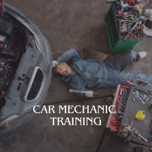 A car mechanic is lying among car parts and tools, which dramatically illustrates Car Mechanic Training.