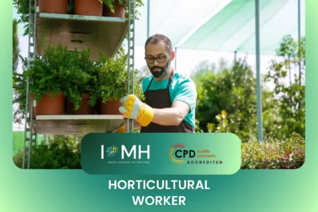 Horticultural worker managing plants in CPD-accredited professional training programme by IOMH in garden setting