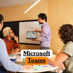 Theoretical enterprise collaboration and unified communications training banner featuring a diverse corporate project team conducting an agile sync meeting around a white round table in a modern office with light wood paneling.
