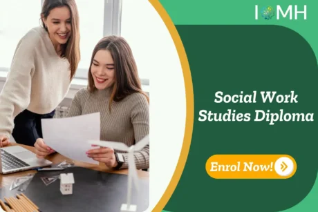 Smiling professionals reviewing documents at desk with laptop and house model; promotional banner invites UK learners to enrol in IOMH’s Social Work Studies Diploma.