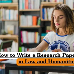 How to Write a Research Paper in Law and Humanities course banner with student studying at desk in library surrounded by books.