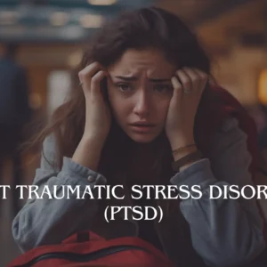 A distressed young woman holding her head illustrates the emotional turmoil of Post Traumatic Stress Disorder (PTSD).