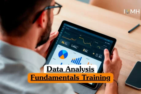 Data Analysis Fundamentals Training course banner with person holding tablet displaying graphs charts and performance metrics at desk with smartphone and pen.