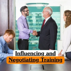 Influencing and Negotiating Training course banner with professionals shaking hands in modern office meeting with colleagues taking notes.