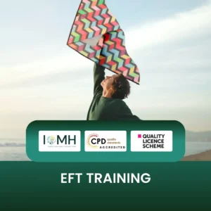 EFT Training course banner with person flying colourful kite on beach.
