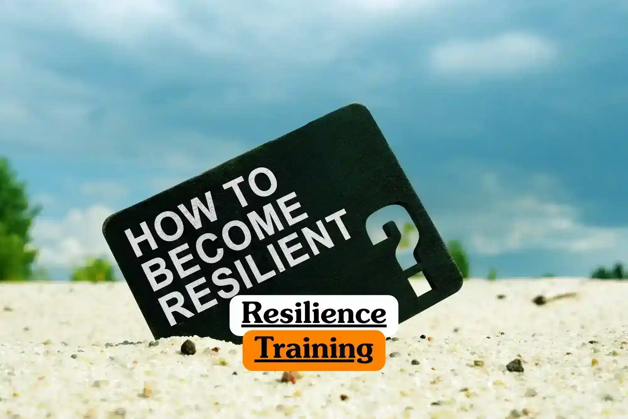 Resilience Training course banner with black rectangular sign embedded in sand reading how to become resilient bold white letters overlay text resilience training with resilience in black on white background and training in black on orange background cloudy blue sky greenery personal development mental strength concept.