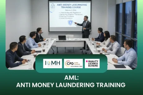 Anti Money Laundering AML training course with business professionals in conference room learning compliance and reporting procedures.