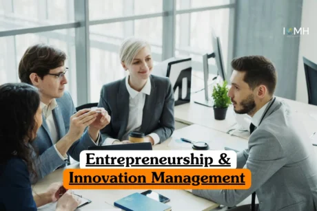 Entrepreneurship & Innovation Management course image showing a collaborative business meeting.
