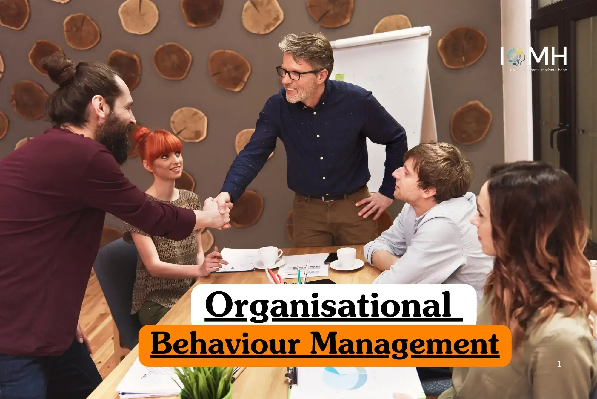 Organisational Behaviour Management course banner with professionals in meeting shaking hands and IOMH logo.