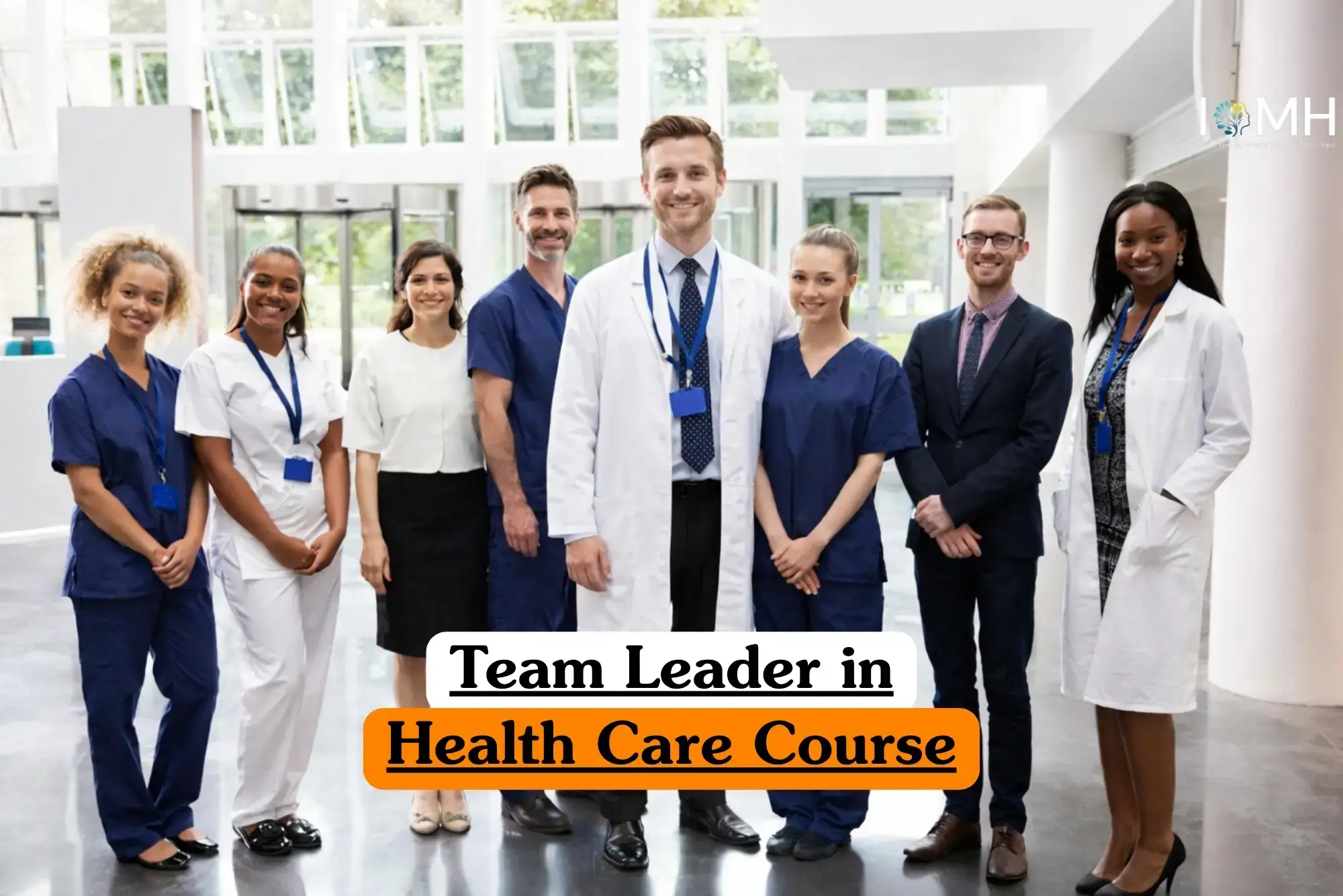 Team Leader in Health Care course banner with group of eight individuals in bright modern indoor setting some wearing medical scrubs and lab coats others in professional business clothing representing healthcare professionals and students in training environment..