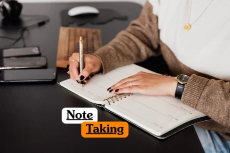 Theoretical information processing and administrative management training banner featuring a close-up perspective of a professional wearing a textured brown sweater and a gold necklace sitting at a dark sleek desk.