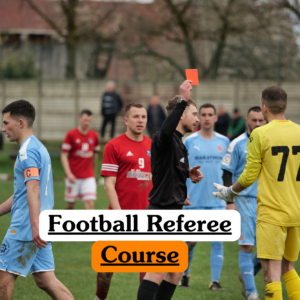 A football referee holding up a red card during a match to illustrate the theoretical principles of officiating, sports rules, and fair play in a Football Referee Course.