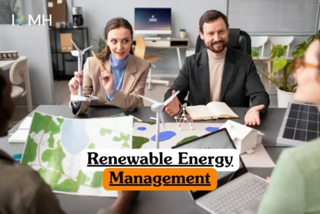 Renewable Energy Management course banner with team discussing wind turbine and solar panel models in office workspace.