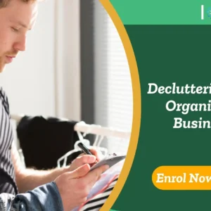 Home organisation specialist taking notes in workspace with clothing rack in background; promotional banner highlights UK-based Decluttering and Organising Business training by IOMH.