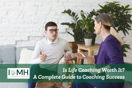 Coach and client in reflective discussion in a cosy, professional space; banner highlights guide to life coaching success.