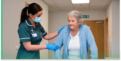 Care assistant trainee receiving practical training in the UK