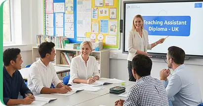 Teaching Assistant Diploma UK training session with adult learners in classroom led by instructor using digital screen.