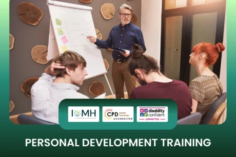 Personal development training banner featuring a professional instructor using a flipchart to teach growth strategies to a group of adult learners.