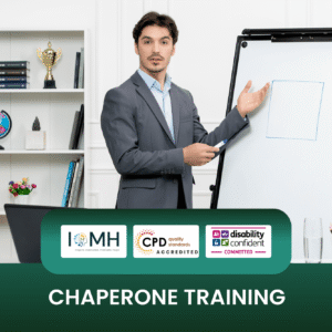 Chaperone training banner featuring a professional instructor in a grey suit pointing toward a whiteboard in a clean office or classroom environment.