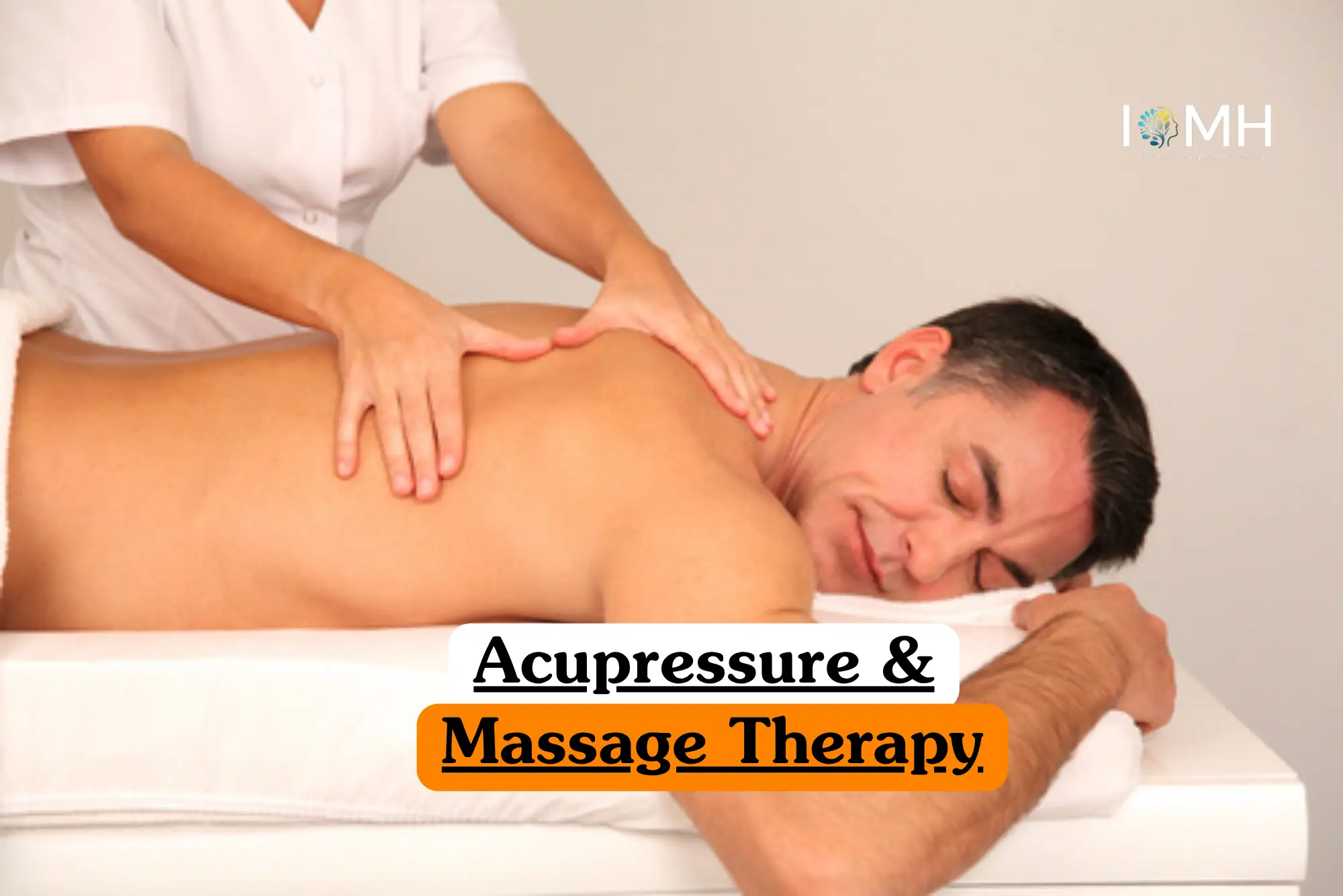 Holistic health and wellness theoretical training banner featuring a close-up of a person receiving a therapeutic massage with smooth, black heated basalt stones placed along their back.