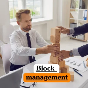 Theoretical property management and real estate training banner featuring two professionals in business attire collaborating to stack wooden blocks on an office desk, symbolizing the study of structural management, residential block administration, and estate coordination principles.
