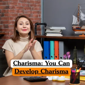 Theoretical personal development and leadership training banner featuring a professional woman in a beige turtleneck sweater sitting at a desk, gesturing with her hands while engaging in a discussion within a modern office setting.