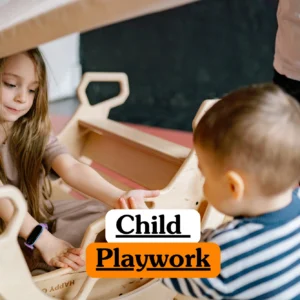 Theoretical early years education and childcare training banner featuring a group of young children playing with colorful building blocks on a classroom floor while supervised by an adult, representing the study of playwork principles, cognitive development through play, and early years foundation stage (EYFS) supporting strategies.