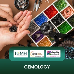 Gemology training banner featuring a top-down view of a professional workspace where an individual is sorting black gemstones by hand next to a white box filled with various colorful beads and jewelry components.