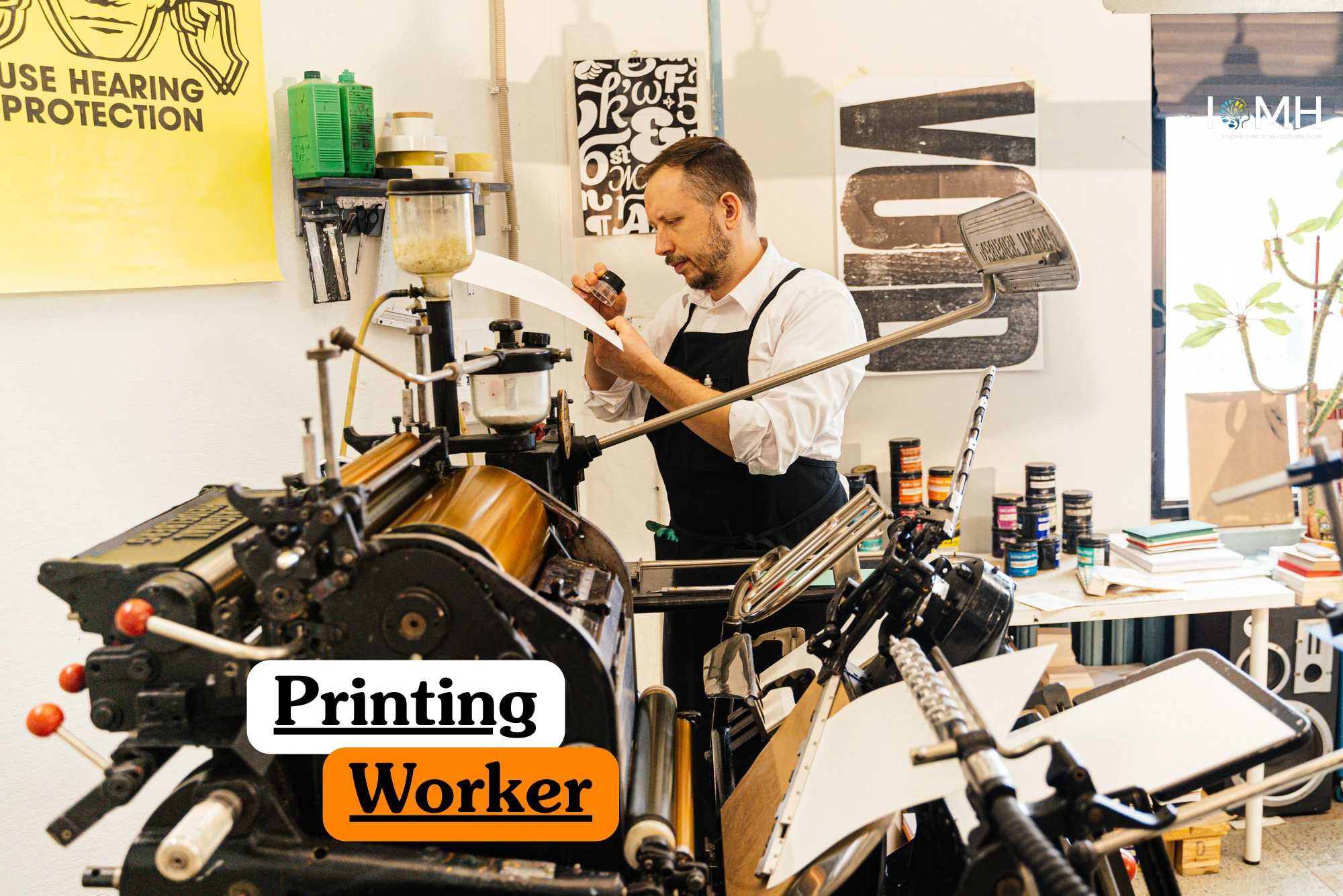 Theoretical industrial arts and commercial printing training banner featuring a professional printer in a black apron meticulously inspecting a printed sheet using a magnifying loupe.