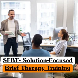 Theoretical psychotherapy and mental health counseling training banner featuring a male instructor in a grey blazer standing and gesturing while leading a small, diverse group of adults in a bright, modern office setting.