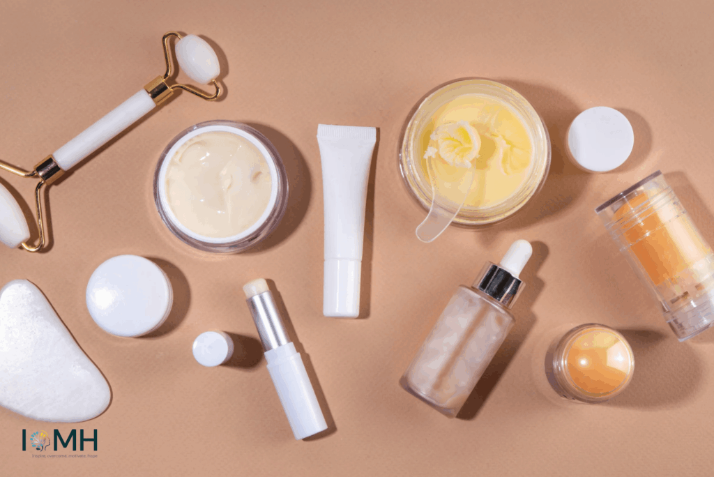 Flat lay of natural skincare products and tools including facial roller, creams, balms, and gua sha for sensitive skin care
