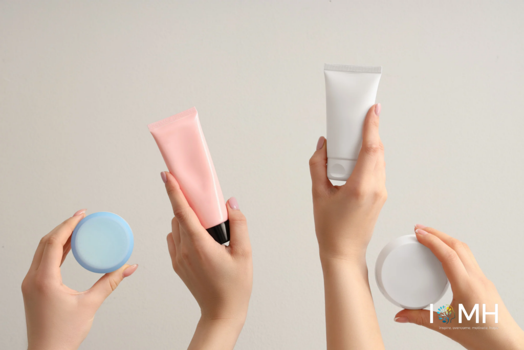 Hands holding gentle skincare products including jars and tubes suitable for sensitive skin