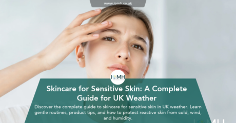 Woman checking her sensitive skin with a concerned expression, featuring a complete guide to skincare for UK weather